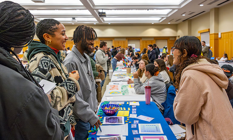 Peers interact at the spring involvement expo