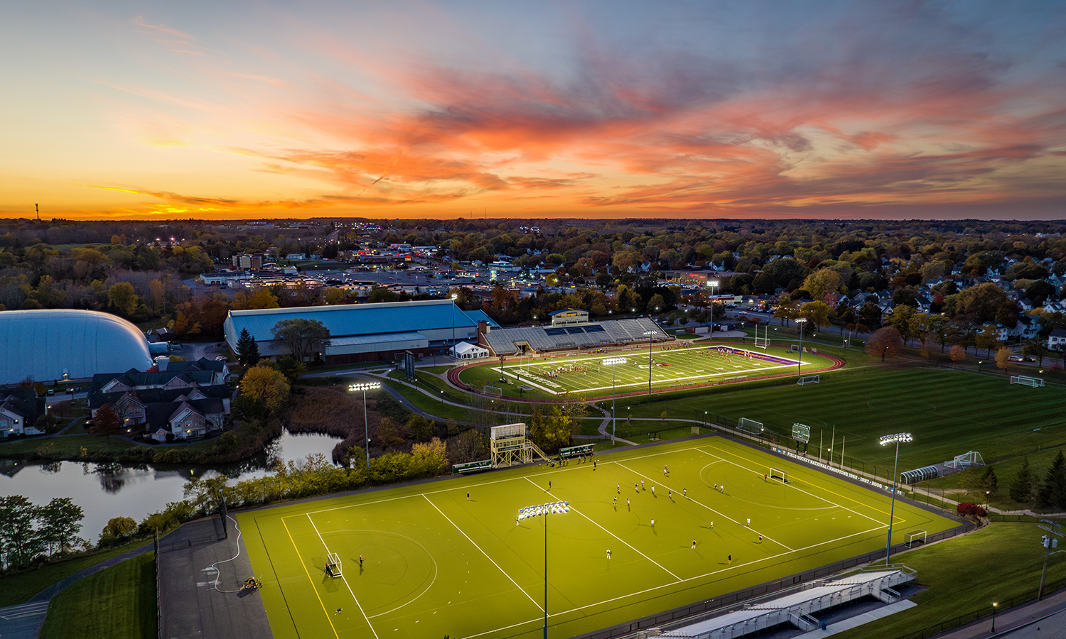 sunset over athletic fields