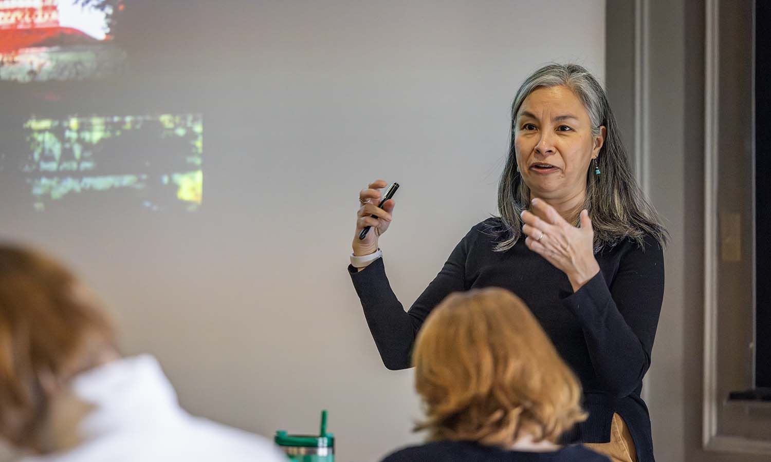 Professor of Art and Architecture Lara Blanchard leads a lesson on Burmese and Thai art and architecture during “Buddhist Art and Architecture” in Houghton House.