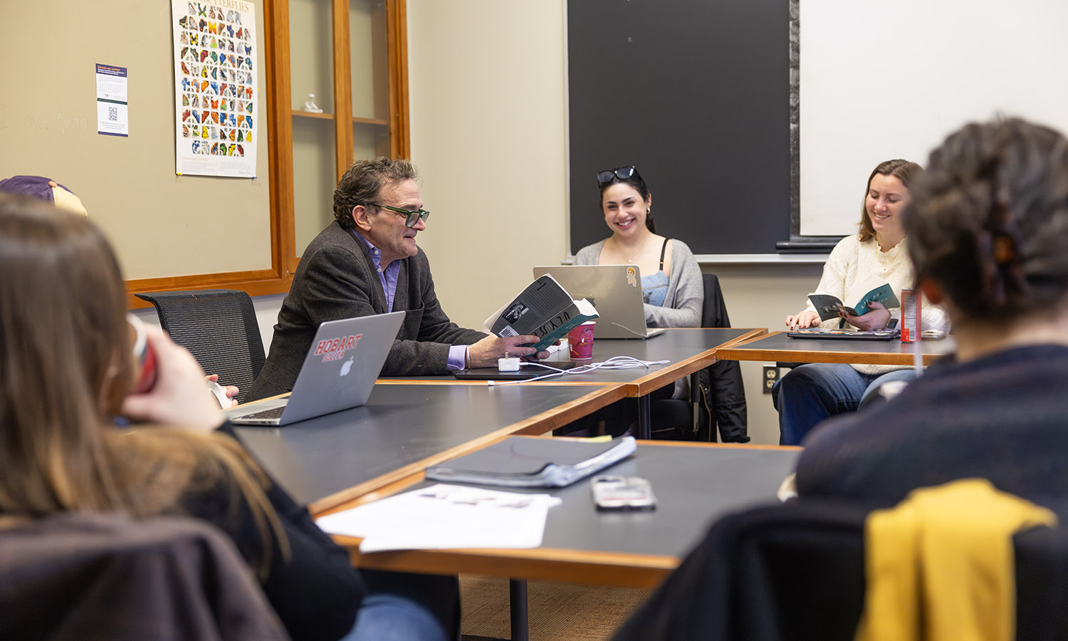 Associate Professor of English and Creative Writing Stephen Cope and students review a passage in James Joyce's novel
