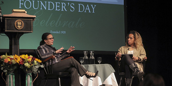 two women in discussion on Founder's Day