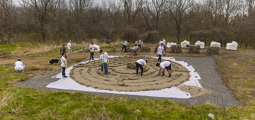 Students building Labyrinth