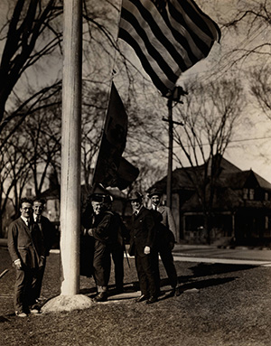 President Bartlett raising the centennial flag.